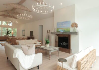 Living area with fireplace and beamed vaulted ceiling