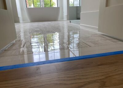 Polished large-format tile floor in a bright open room
