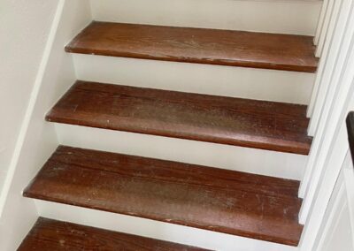 Rebuilt staircase with hardwood treads and painted risers
