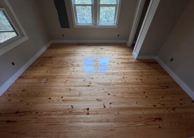 Wide-plank hardwood floor after refinishing